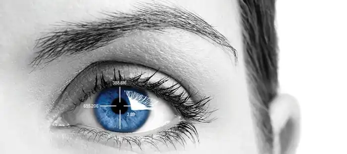 Close-up of an eye with measurement markers on the pupil